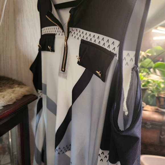 New lite long sleeve with holes cut out  in shoulder,,medium w style front zippe - Picture 3 of 5